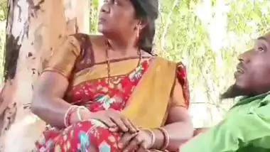 Outdoor sex of a handicapped man with a milf in the jungle